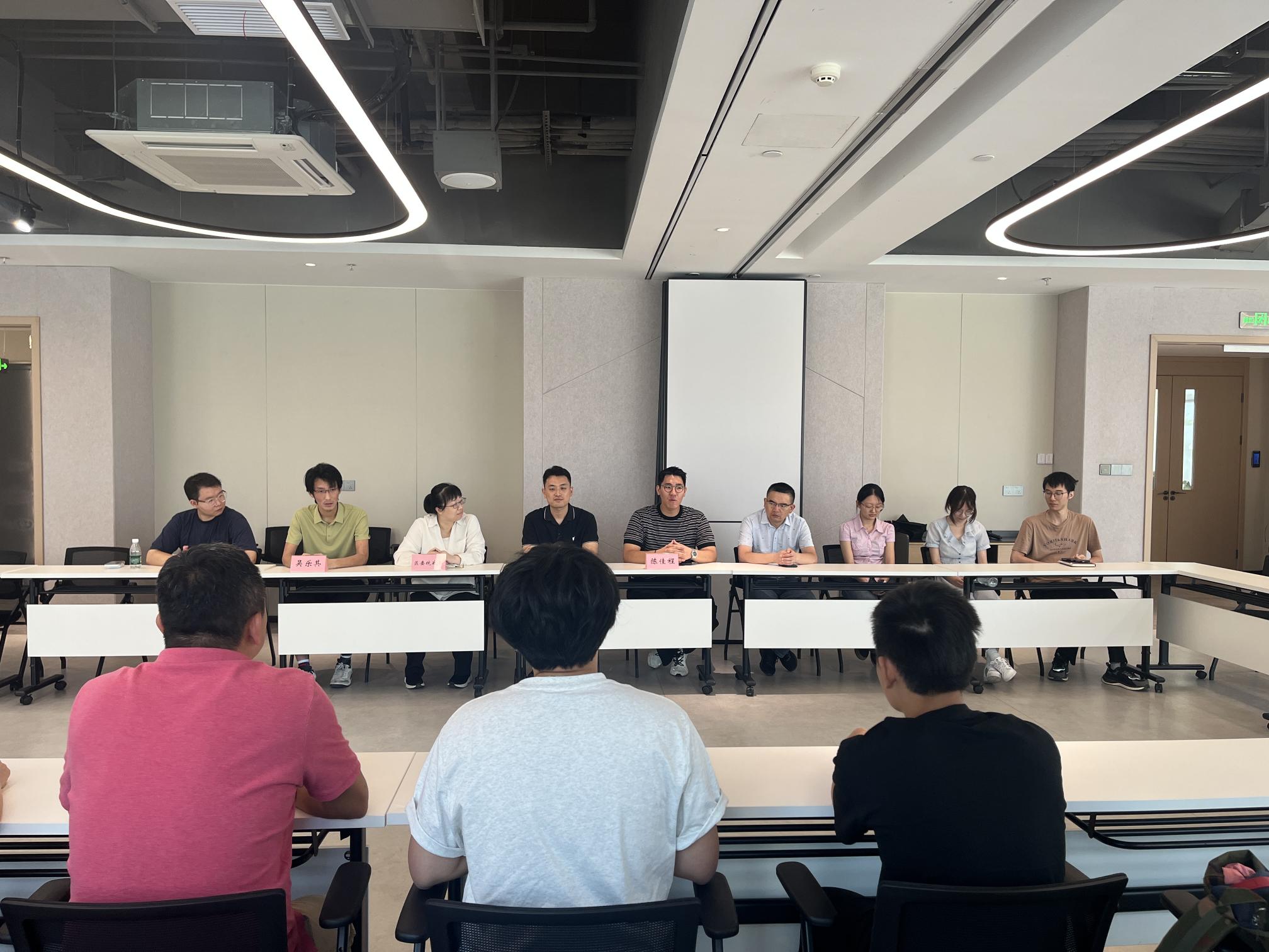 Students and teachers engaging in roundtable discussions